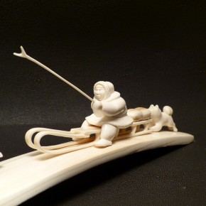 Rentierschlitten mit Husky