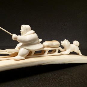 Rentierschlitten mit Husky