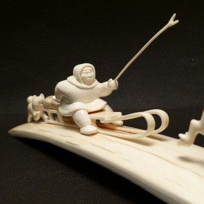 Rentierschlitten mit Husky