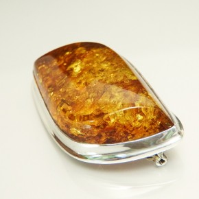 große Bernsteinbrosche in Silber