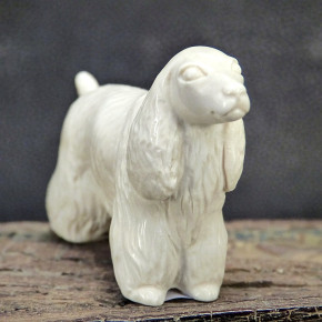 Pudel aus Mammutelfenbein