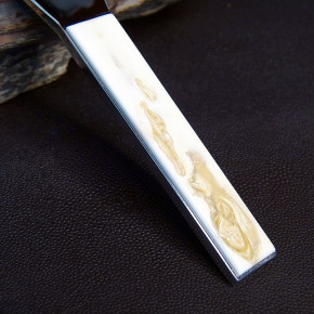 Flaschenöffner mit seltenen Erbsen