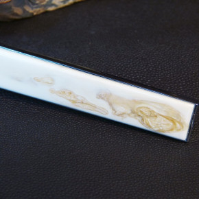 Flaschenöffner mit seltenen Erbsen